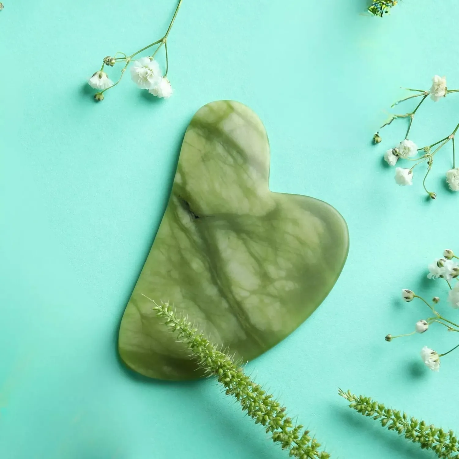 Hedenhus Gua Sha grøn jade ansigtsmassage